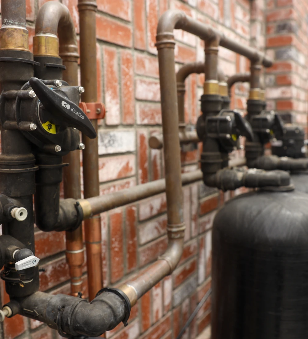 Whole-home water filtration equipment sized for household demand