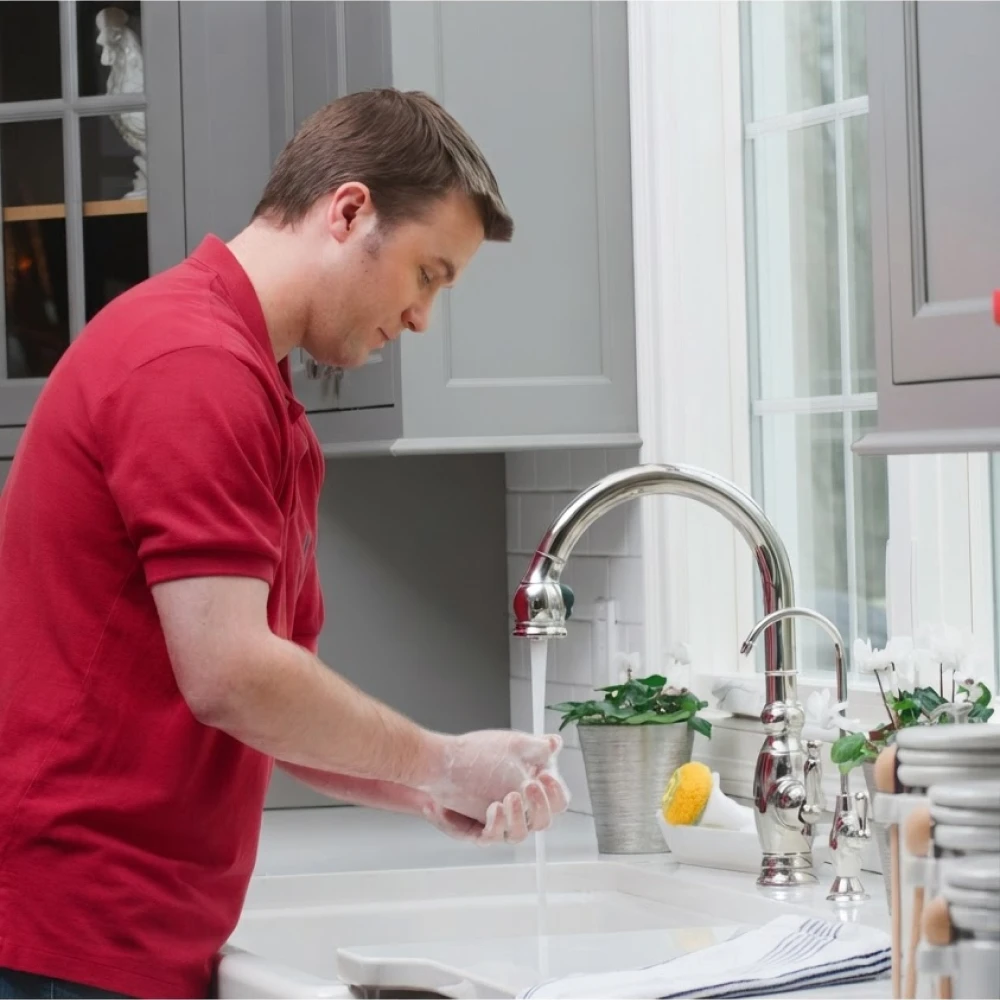 Residential water treatment equipment installed in a utility space